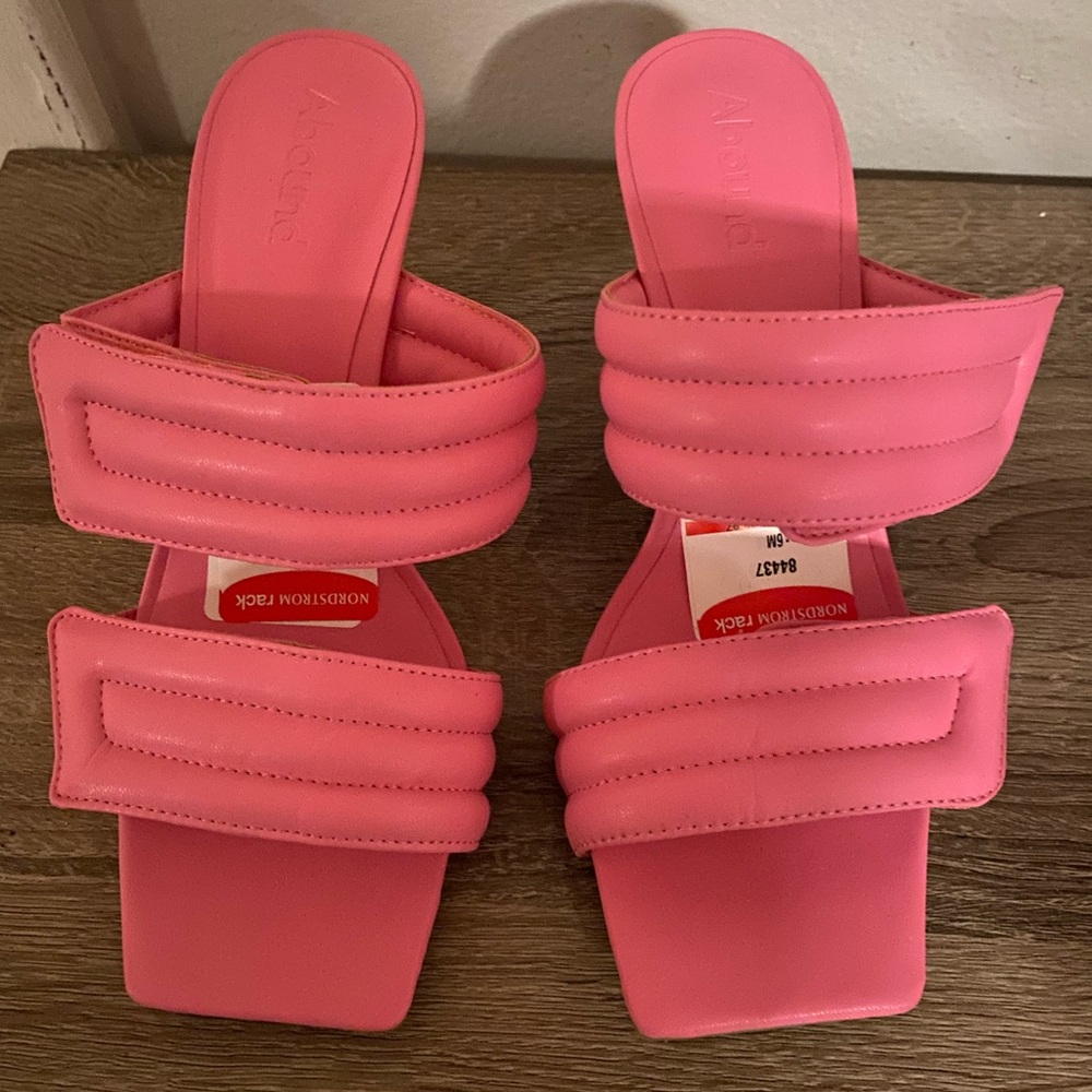 Size 6 pink heels. Never worn.